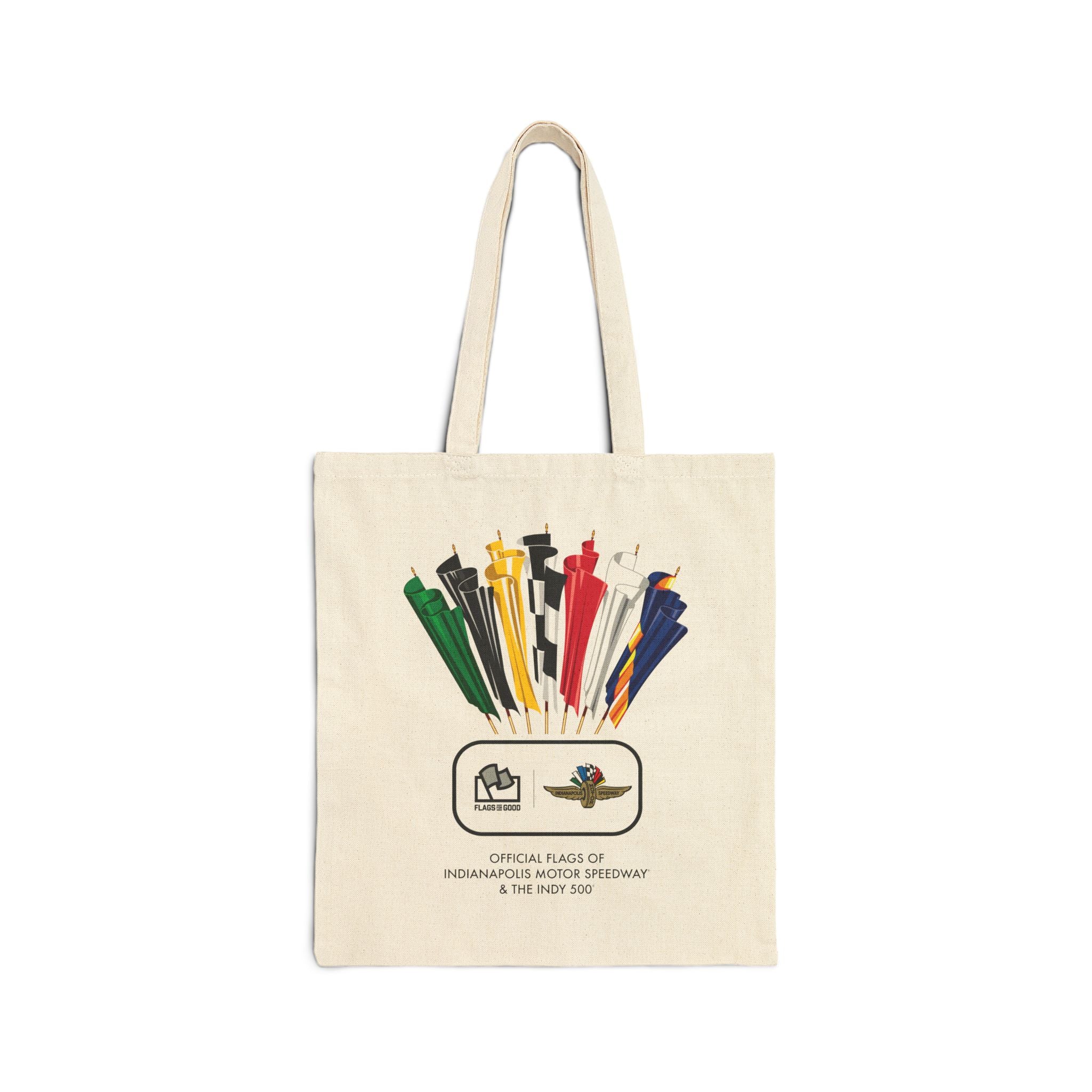 Beige tote bag with a vintage racing flag design, the 'Flags for Good', and the 'Indianapolis Motor Speedway' logo