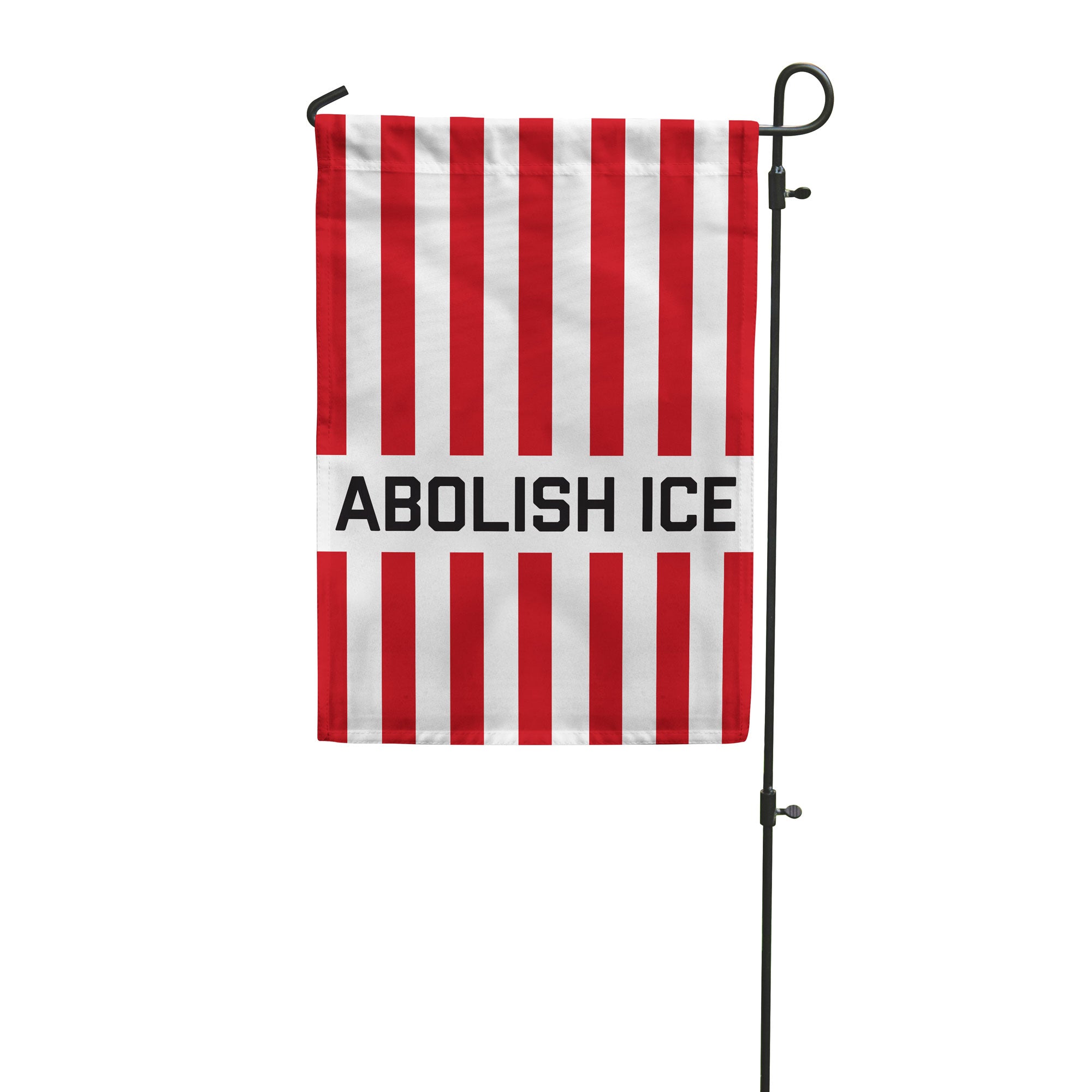 Red and white vertical striped garden flag with 'ABOLISH ICE' text on a white background