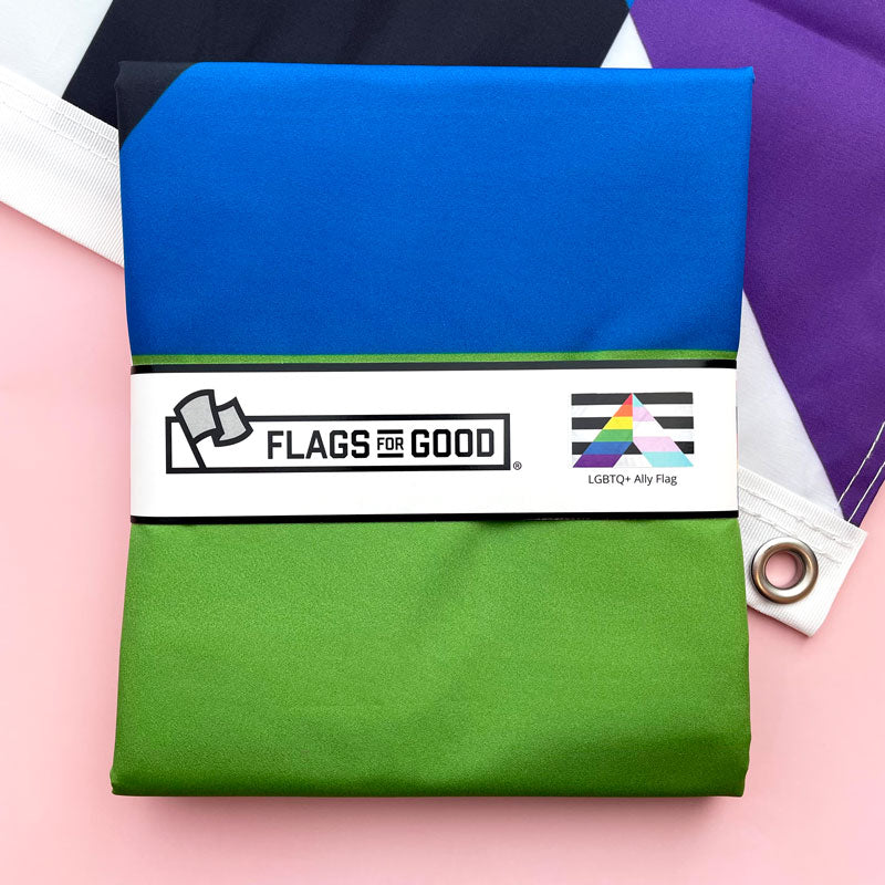 folded double-sided lgbtq+ ally flag with 'Flags for Good' band 