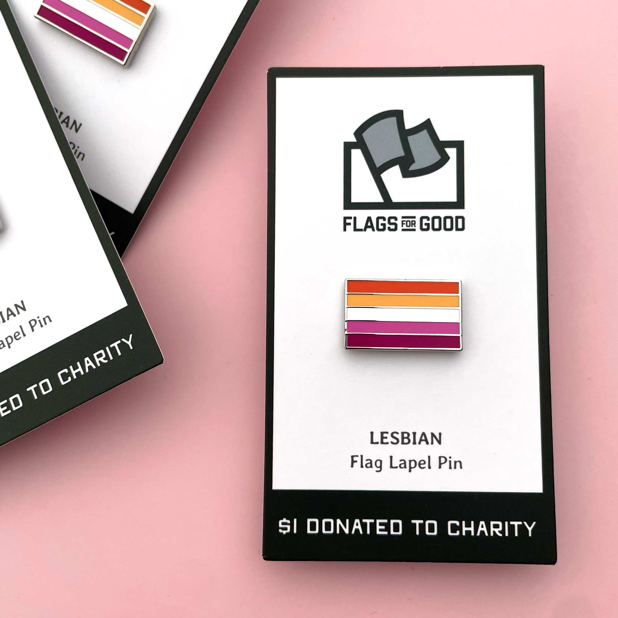 Lesbian flag lapel pin with 'Flags for Good' branding on a pink background