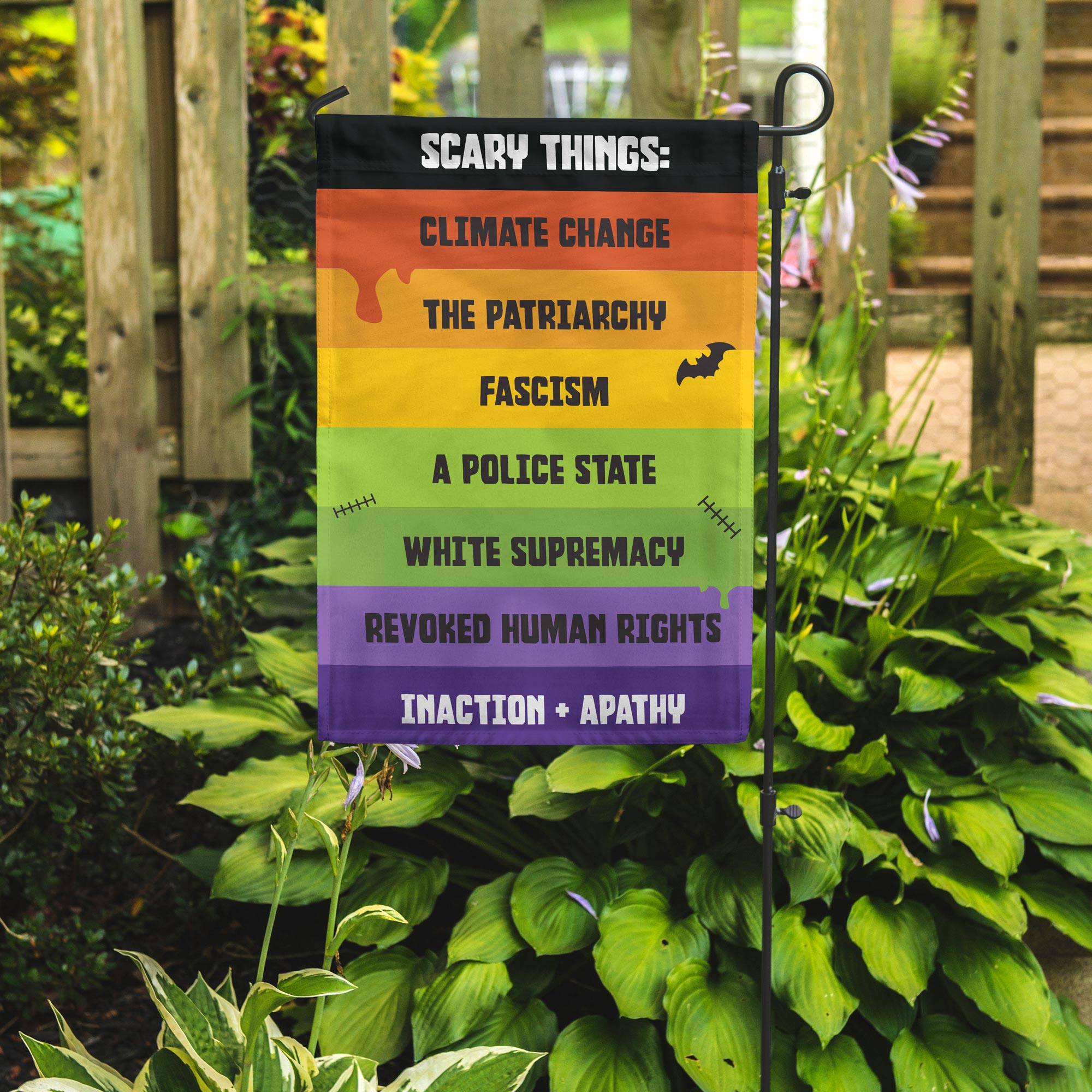 Full color garden flag in a garden setting. 